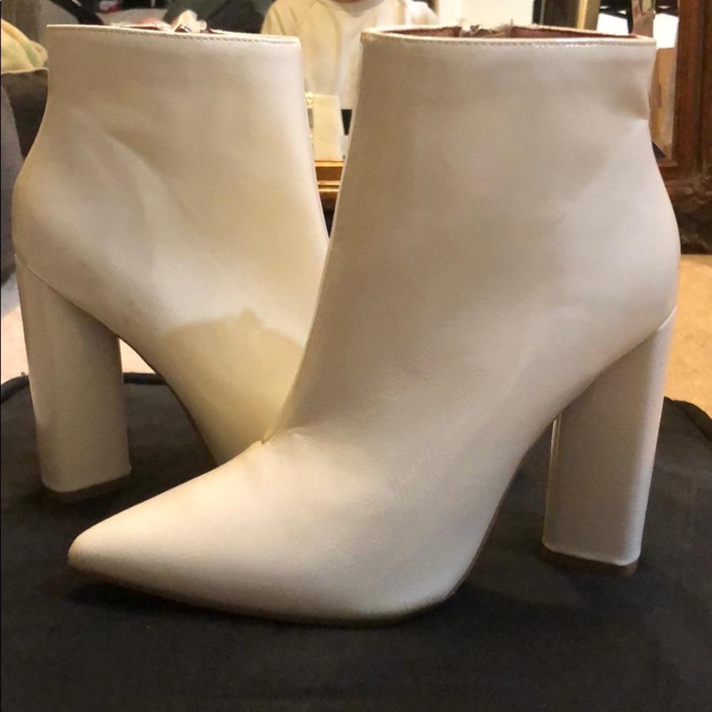 Brand new white booties